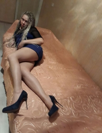 Оля